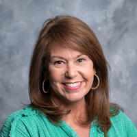 Ms. Adrian Anne Smith