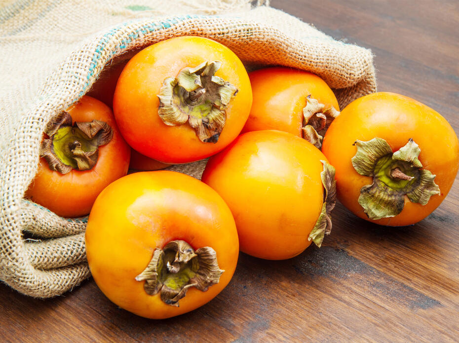 Orange Persimmons in a bag