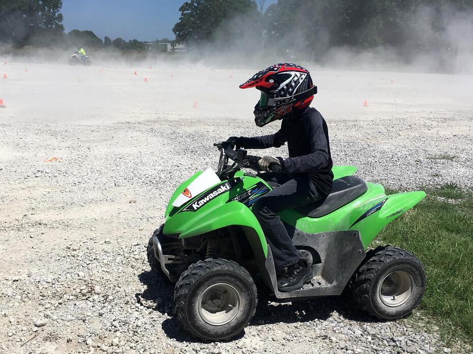 Person on a green ATV