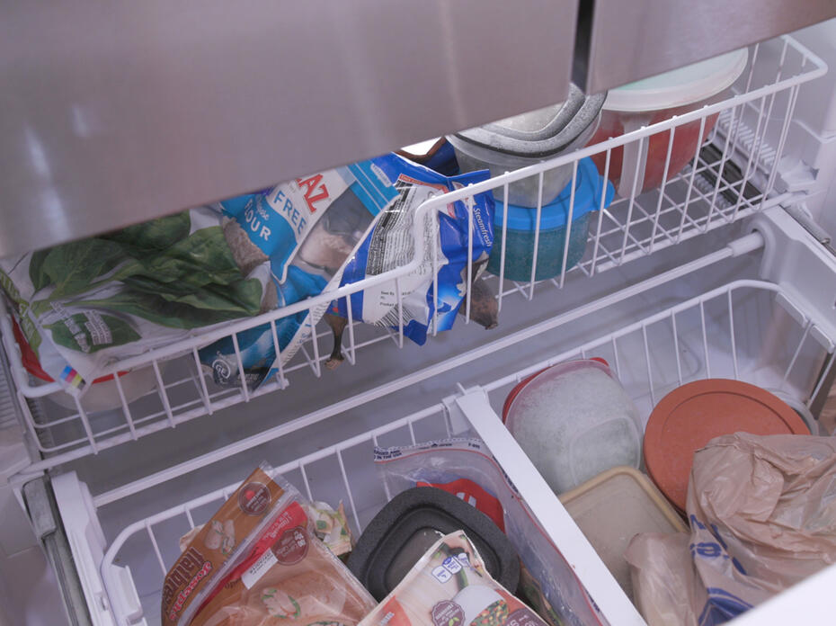Frozen foods sit in the freezer.