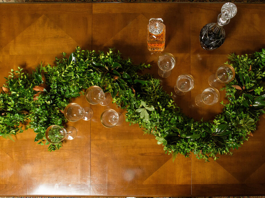 Green garland on a table.