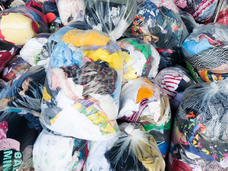 Bags are filled with used clothing.