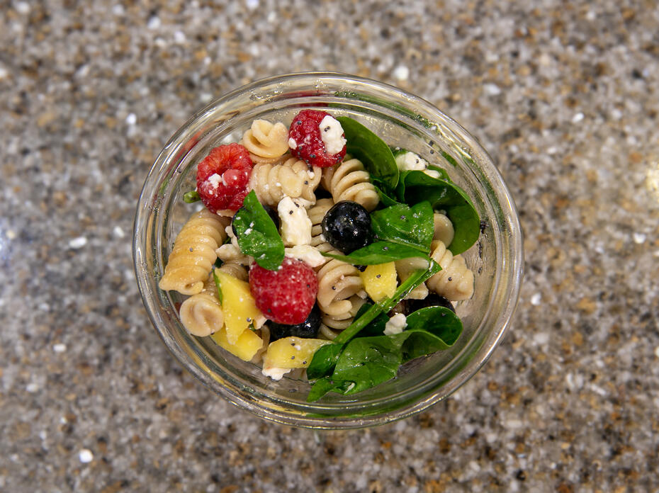 A bowl of Mango Berry Rotini Salad.