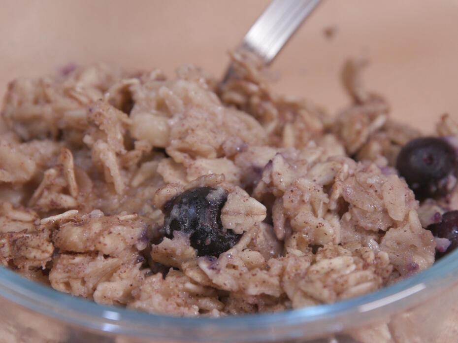 A bowl of blueberry baked oatmeal.