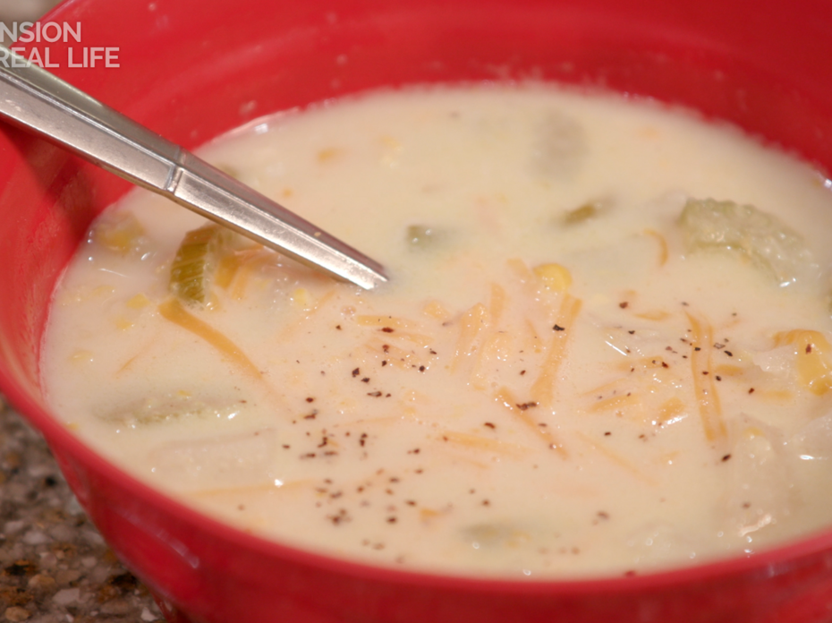 A bowl of potato corn chowder.