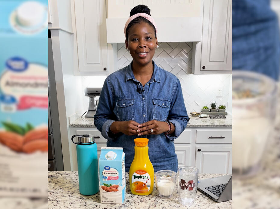 A woman in a kitchen with food products on the counter