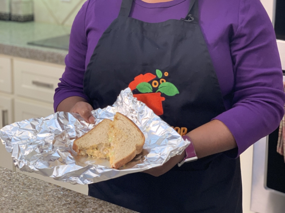 A woman in a kitchen.