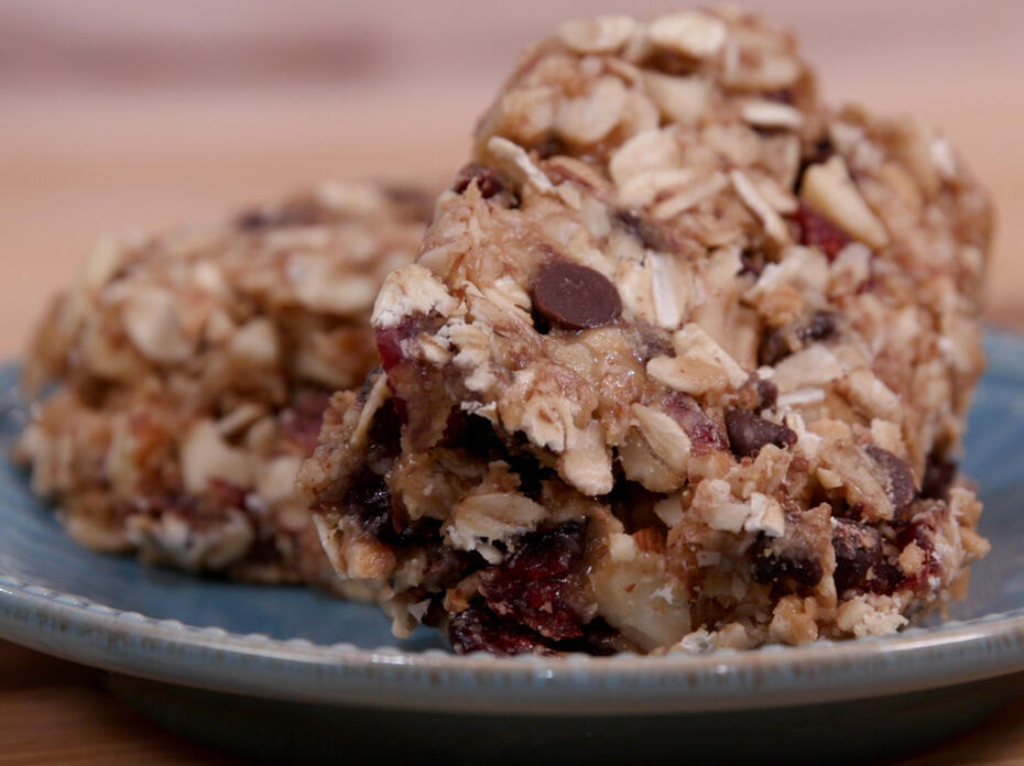 peanut butter chocolate granola squares on a blue-gray plate