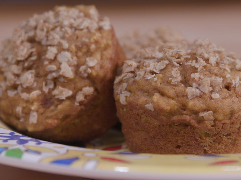 pumpkin spice oatmeal muffins on a colorful plate