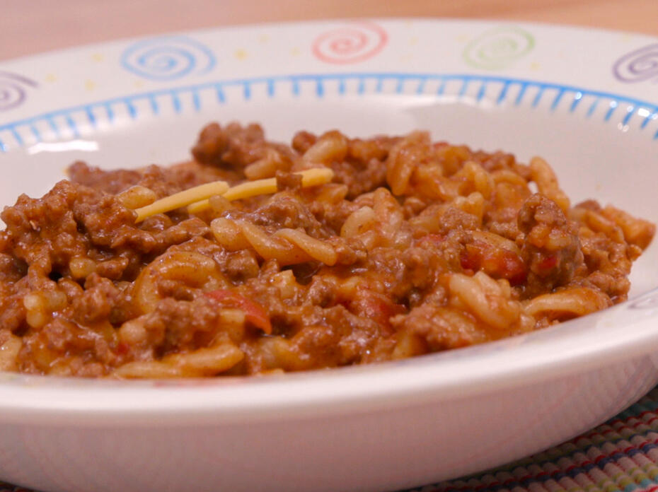 Bowl of Taco-mac, ground beef and macaroni dish.