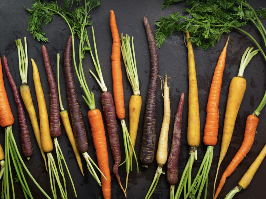 Purple, yellow, and orange carrots. 