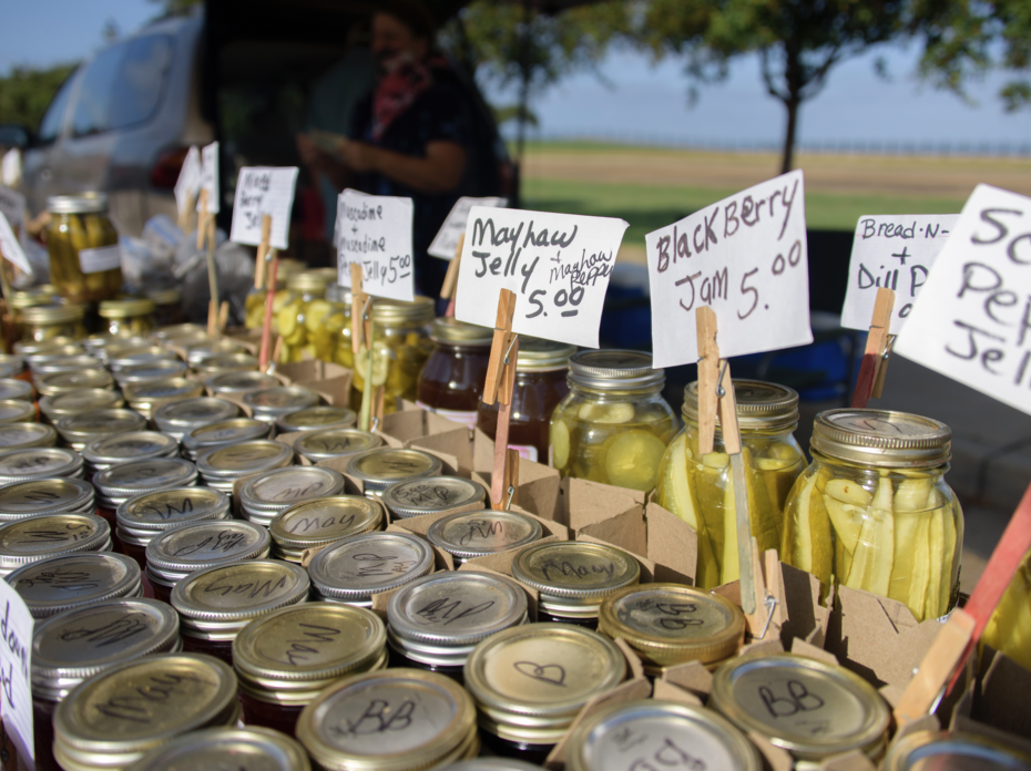 Canned goods at a farmers market.