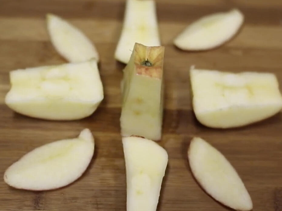 apple slices on cutting board.
