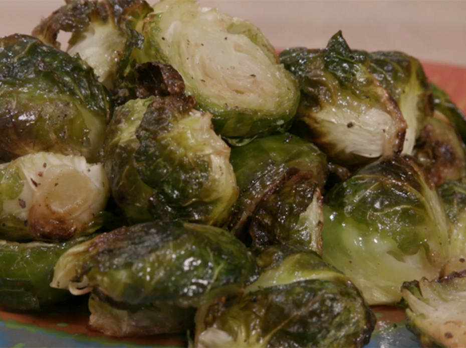 Roasted Brussels sprouts on a serving dish.