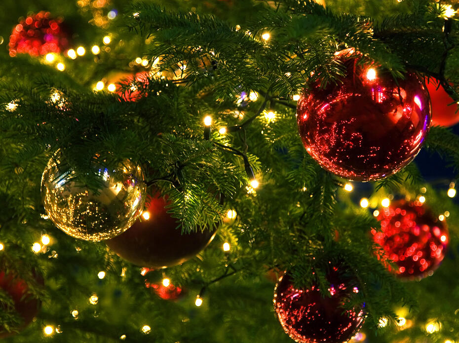 Closeup of ornaments and lights on a Christmas tree
