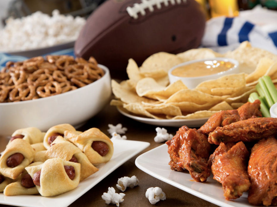 Various finger foods arranged buffet style.