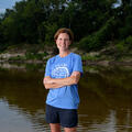 Abby Braman standing in a creek.