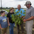 Two MSU Extension agronomy specialists instruct youth campers.