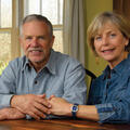 A man and woman sit at a table.
