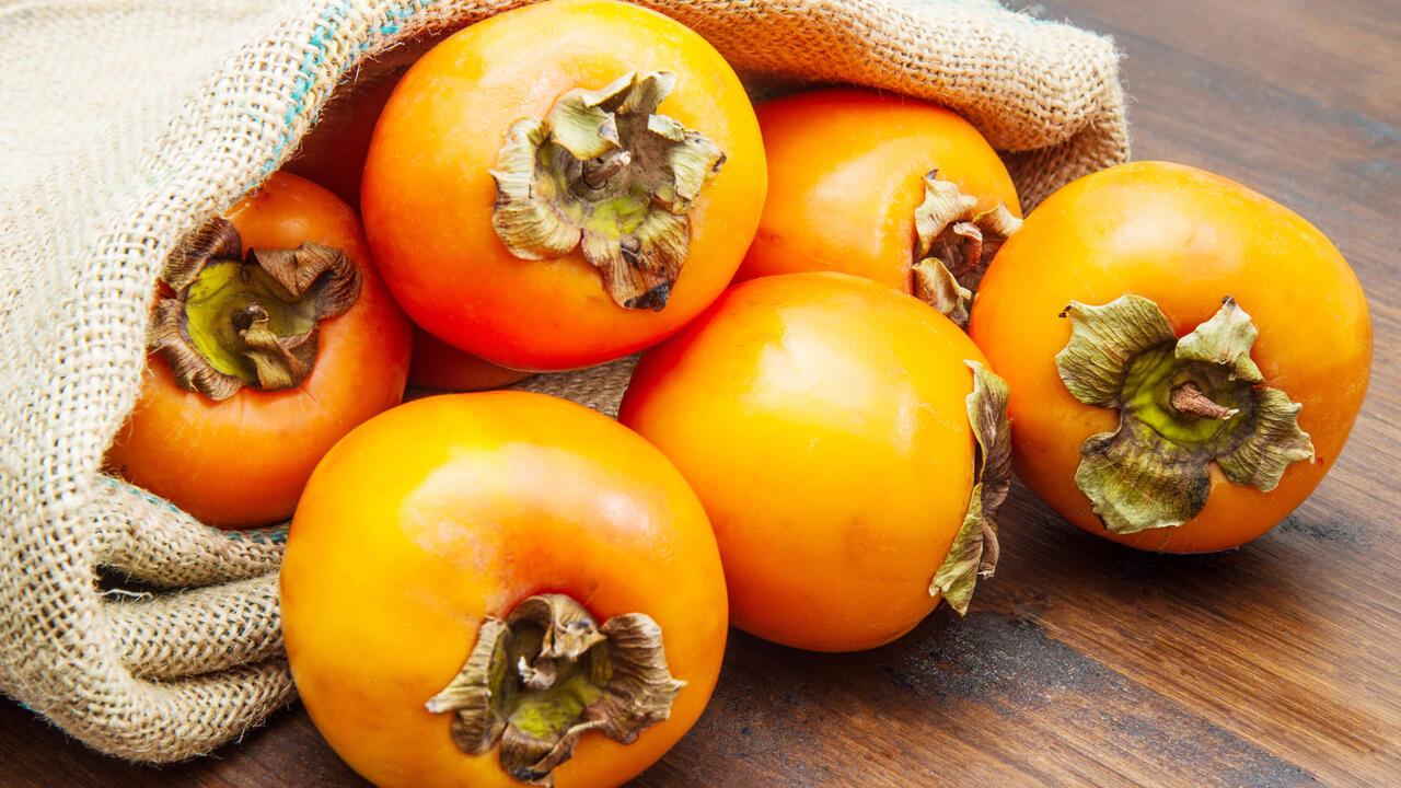 Orange Persimmons in a bag