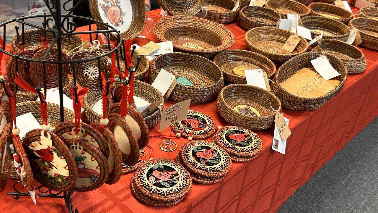 Closeup of pine straw baskets sitting on a table.