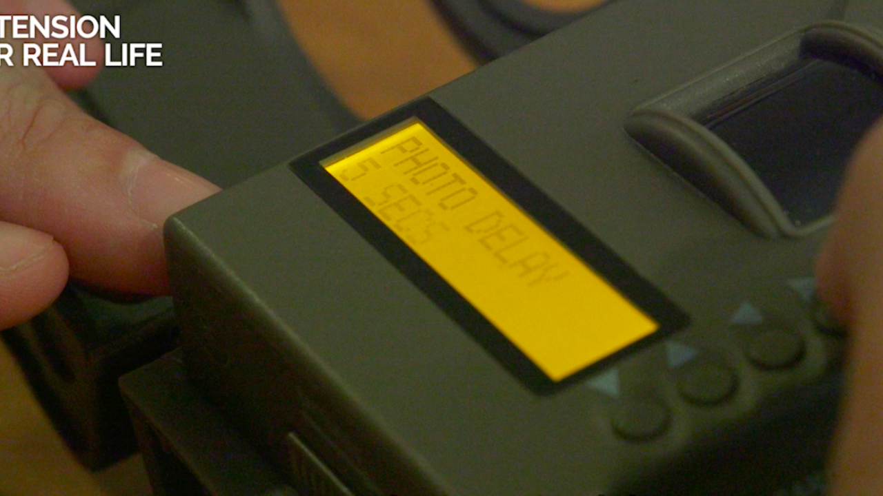 A close-up of a trail camera’s display window as it is being programmed.