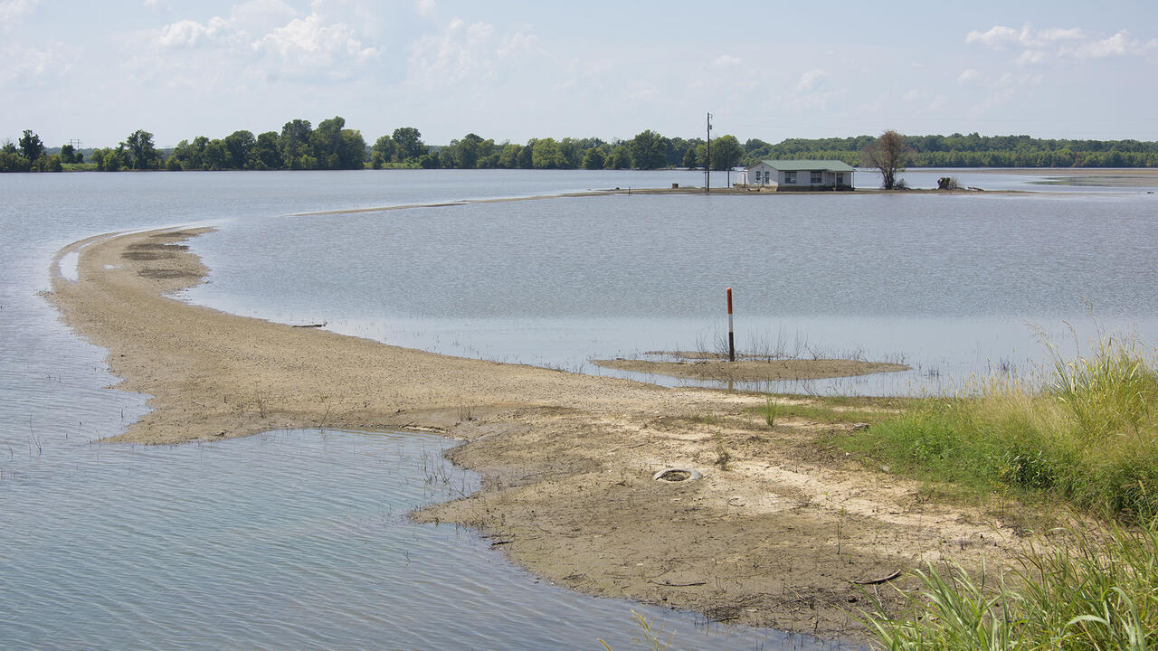 Flood waters surround a home in the south Delta.