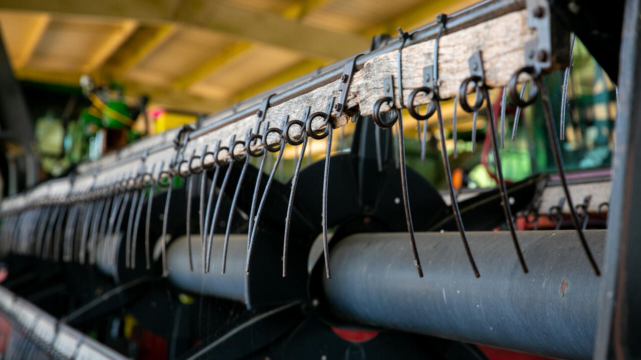 Close-up of a combine header used for harvesting 
