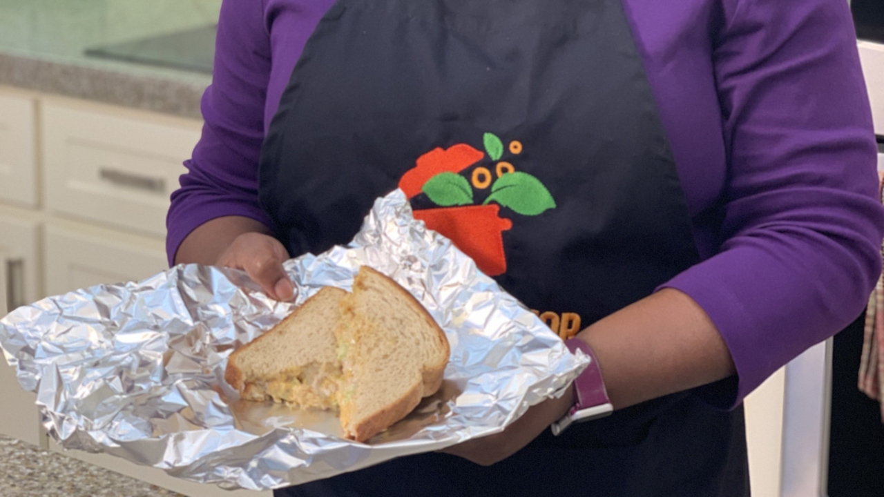 A woman in a kitchen.