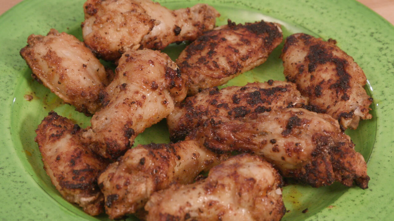 A plate of chicken wings cooked in the air fryer.