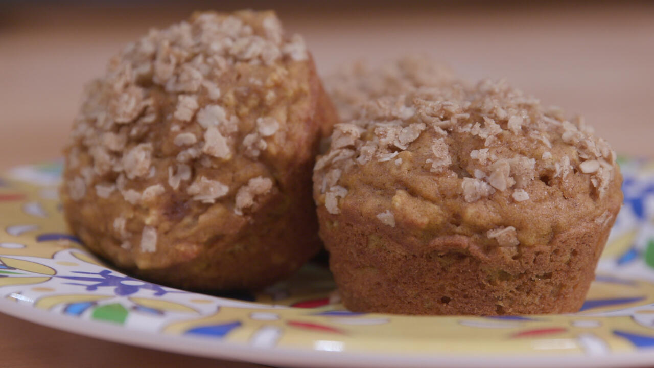 pumpkin spice oatmeal muffins on a colorful plate