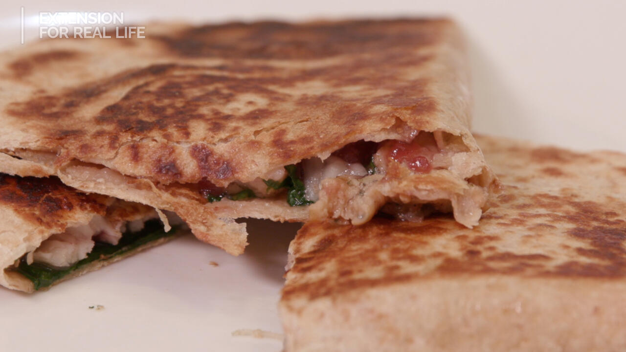 Close up of a sliced quesadilla.