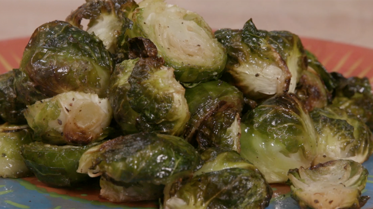 Roasted Brussels sprouts on a serving dish.