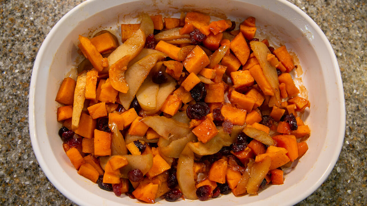 A closeup of sweet potato and apple casserole