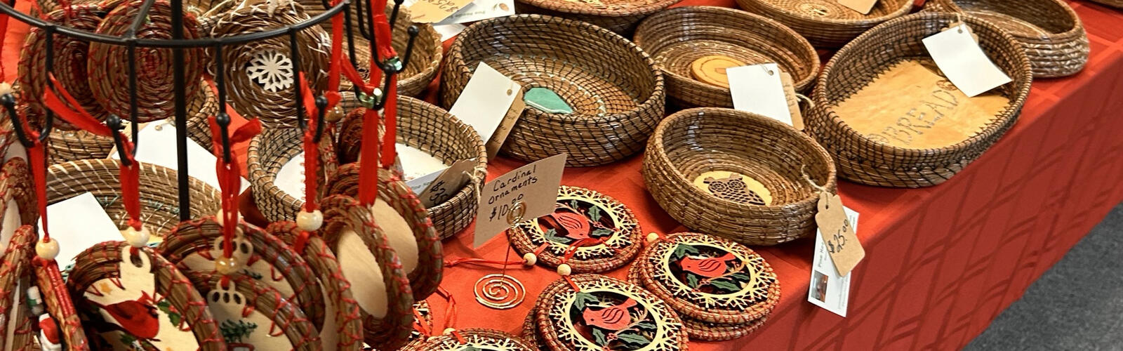 Closeup of pine straw baskets sitting on a table.