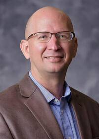 Dr. Eddie Miles Louis Smith