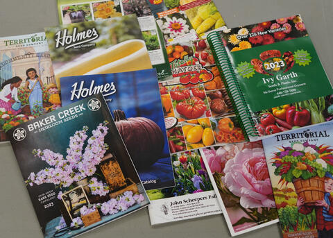 A spread of seed catalogs.