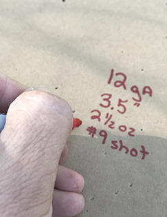 Handwritten note to keep track of the distance and type of ammunition.
