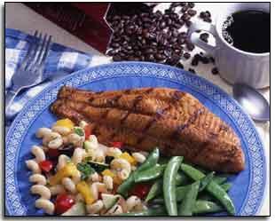 A meal served on a plate with coffee.