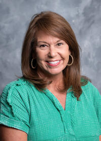 Ms. Adrian Anne Smith