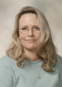 Ms. Suzanne R. Creely
